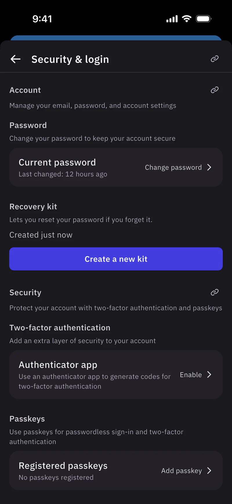 The Security & login settings on iOS, with Current password, a Recovery kit section that says Lets you reset your password if you forget it. and Created just now, a Create a new kit button, and the Two-factor authentication and Passkeys sections below